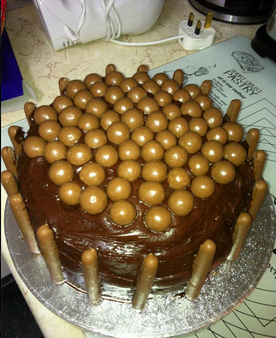 Killer chocolate fudge malteaser cake!.gif