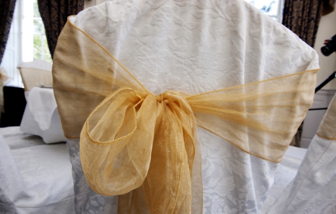 gold mesh chair ribbon wedding