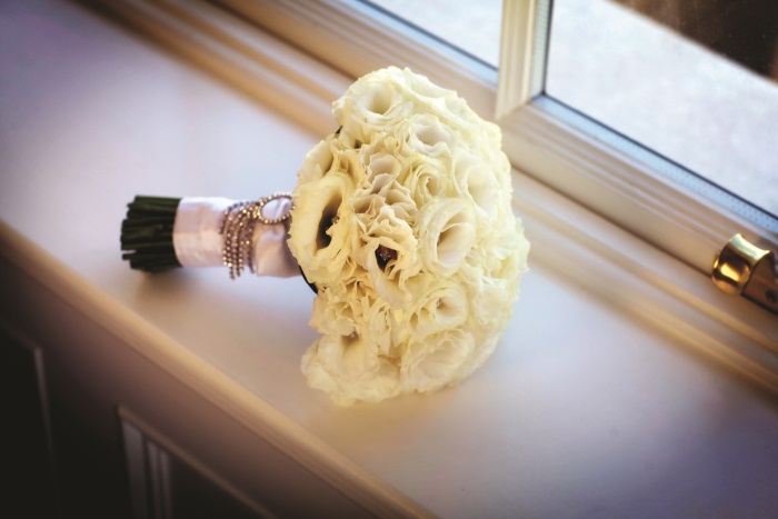 cream bouquet with brooch