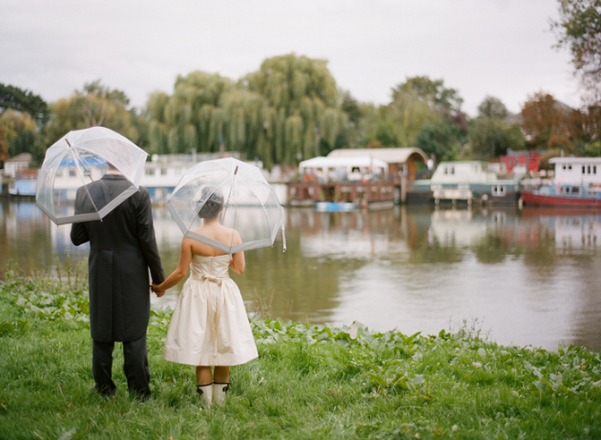 wedding day rain umbrellas image