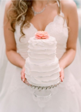 blush ruffles wedding cake