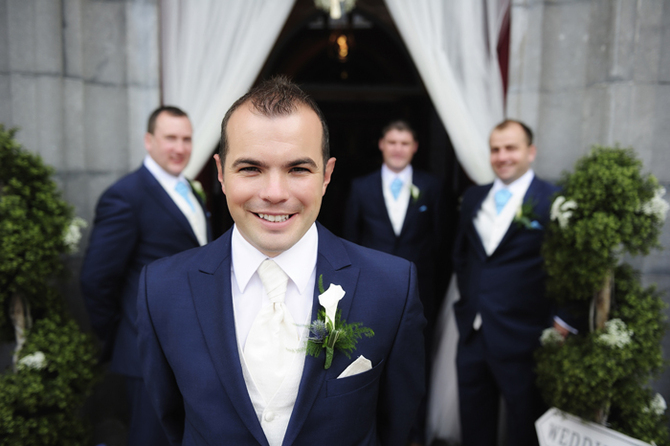 weddng groom photo outsde church