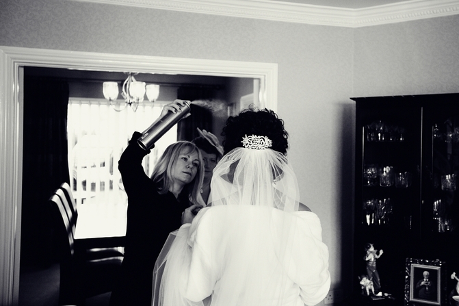 bride getting hair done